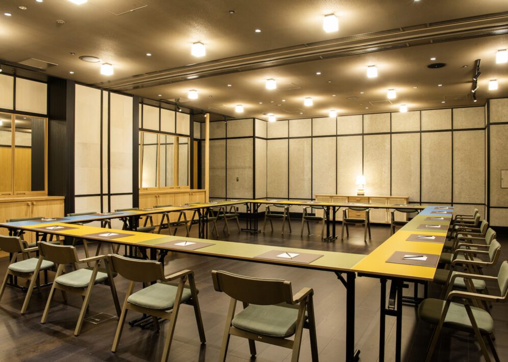 A large room that provides various configuration options, including a hollow rectangle with many seats